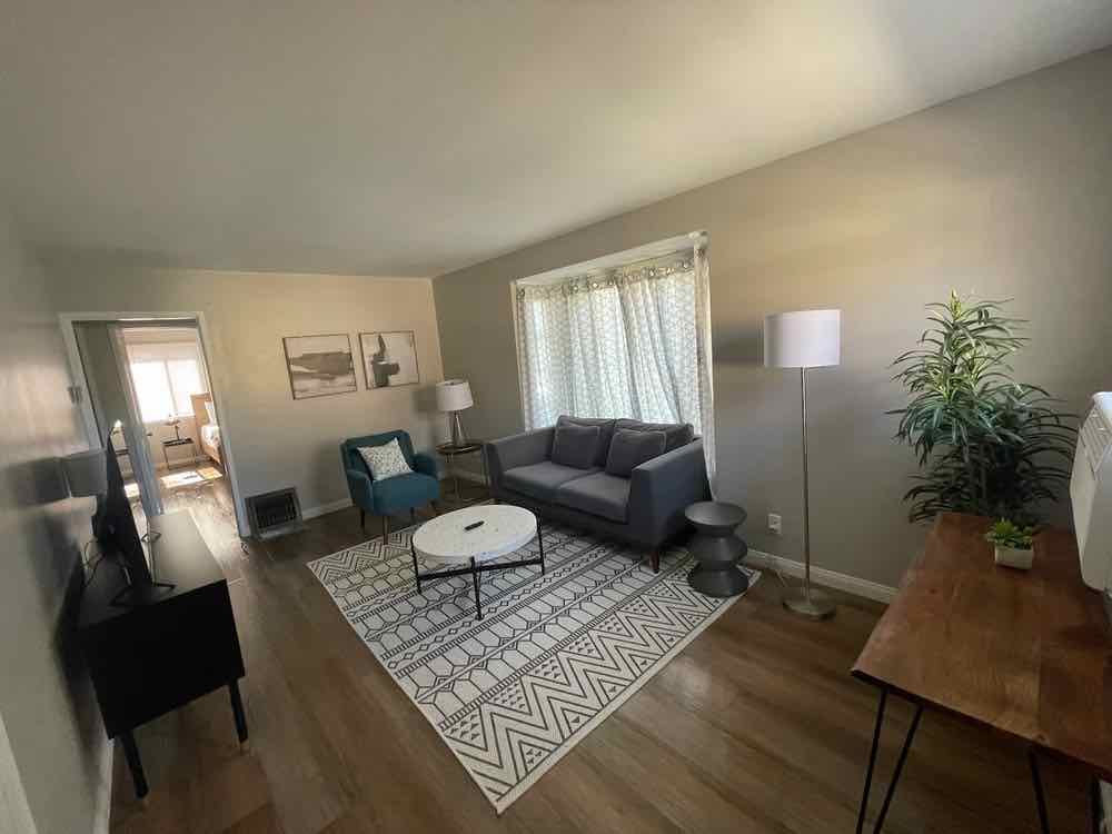 A compact west-side living room cleaned and tidied